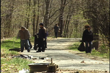 Crew cleaning up along the road