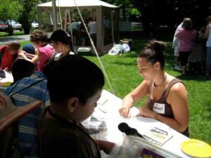 Rachael Lovato, BEAT's Intern, helping kids at BioBlitz