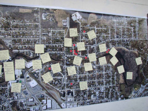 Photo of lots of sticky notes on bulletin board