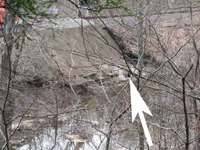 photo with arrow pointing to the little black culvert