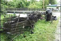 Pile of trash, including 18 more shopping carts, pulled from the river at Columbus Ave