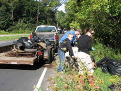 trash being loaded onto a trailer