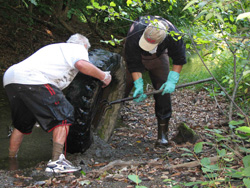 getting a huge tire out of the mud