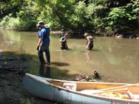 People staring down at the river