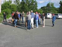photo of group near vans