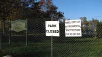 signs saying park closed