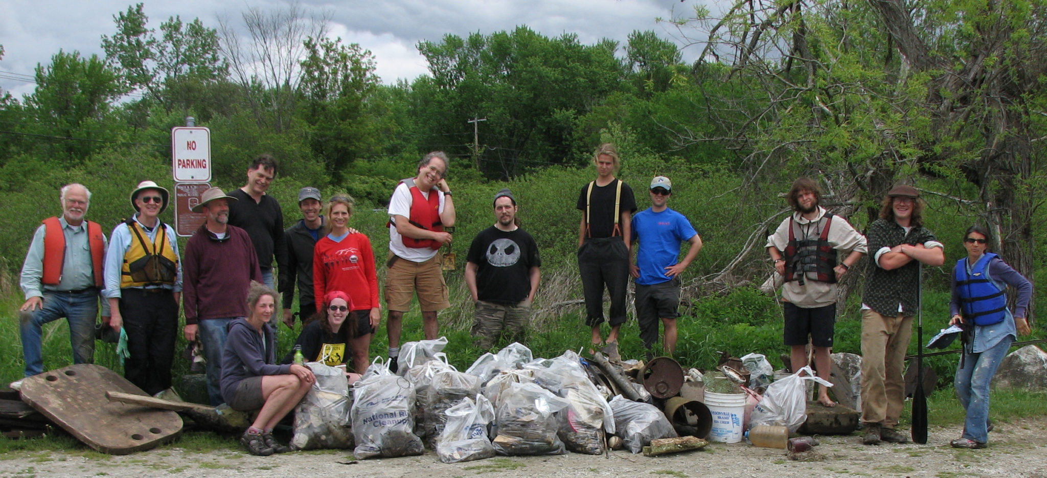 Photo Of Volunteers With Bags And Bags Of Trash