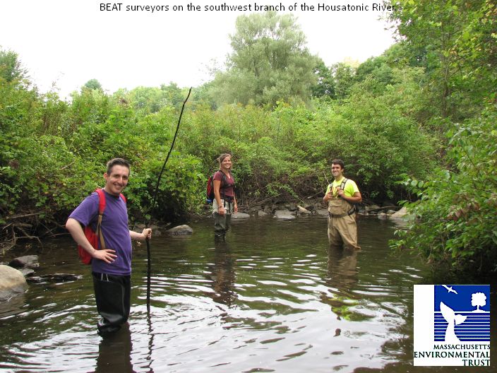 Photo showing David, Mariah and Elia in waders or hipboots looking for stormwater pipes coming into the southwest branch of the Housatonic River.