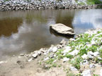 The rock just downstream
